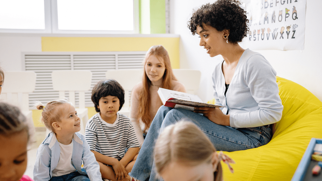 Teacher reading to children at a Palm Bay daycare